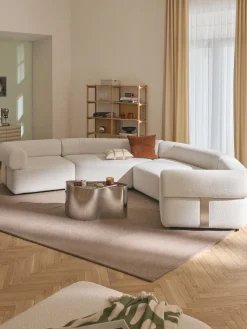 Módulo de esquina redondo en tejido bouclé Anton Sofás