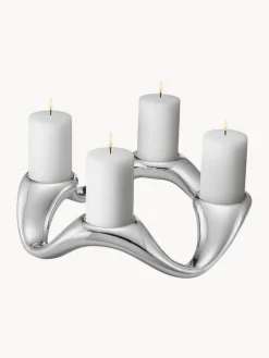 Portavelas|Jarrones></noscript>GEORG JENSEN Portavela de acero inoxidable con forma orgánica Cobra