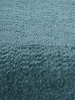 Reposapiés|Sofás></noscript>Westwing Collection Reposapiés puf de borreguillo bouclé Wolke Borreguillo bouclé azul petróleo